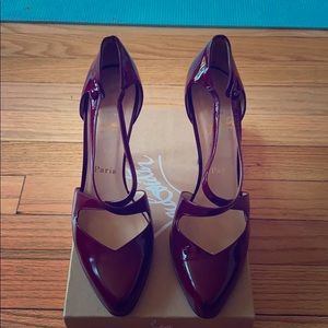 Louboutain burgundy pumps
